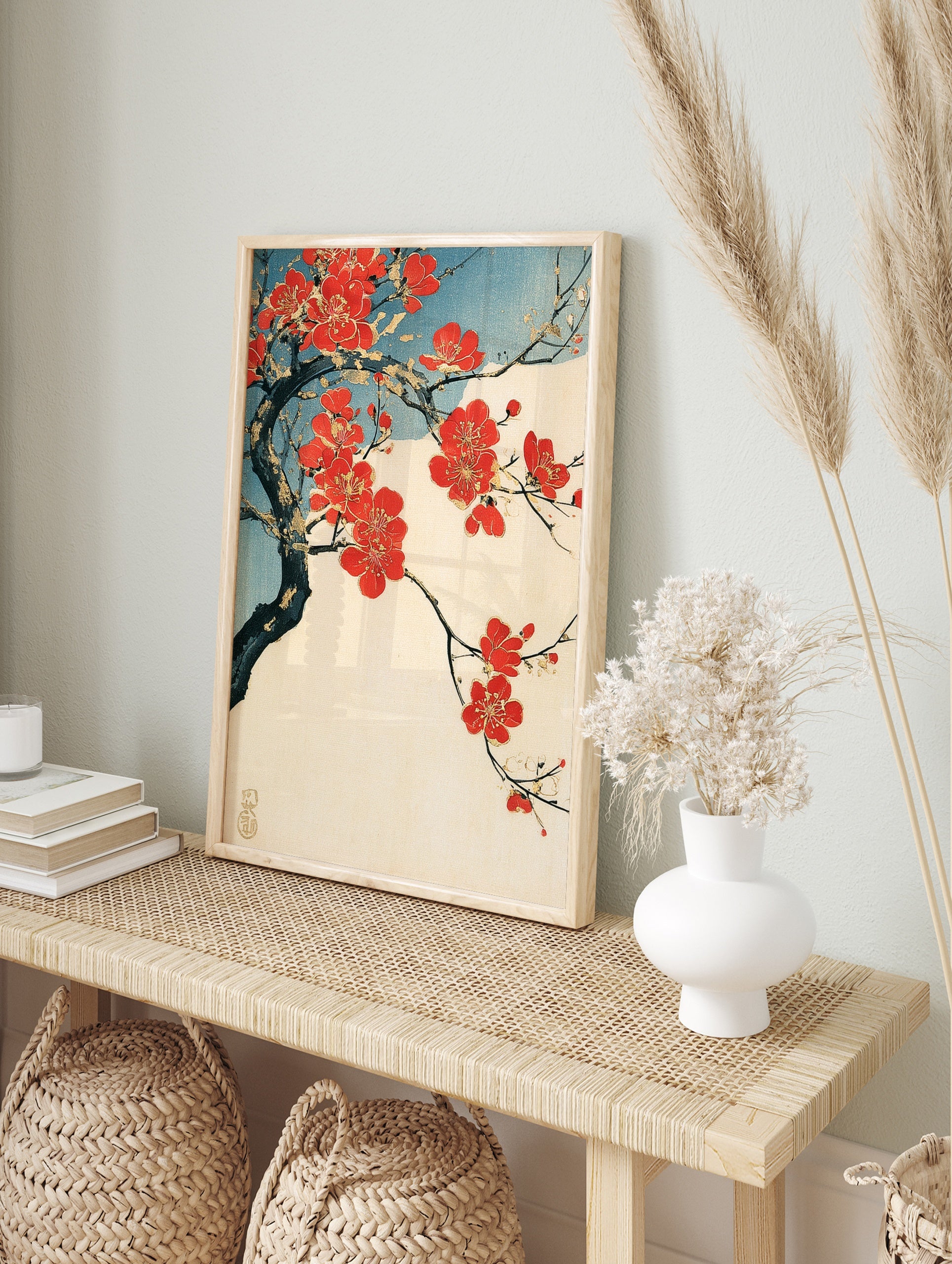 Japanese red plum blossom branch illustration with gold accents on a cream background with a, in an alternate framed mockup