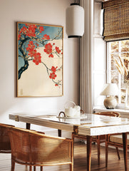 Japanese red plum blossom branch illustration with gold accents on a cream background with a blue, in a styled room mockup