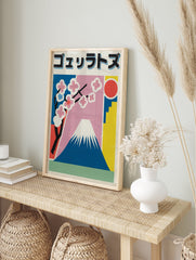 Japanese poster featuring Mount Fuji, pink cherry blossoms, a red sun, and abstract blue and yellow shapes against a pink and blue sky. - Image 4