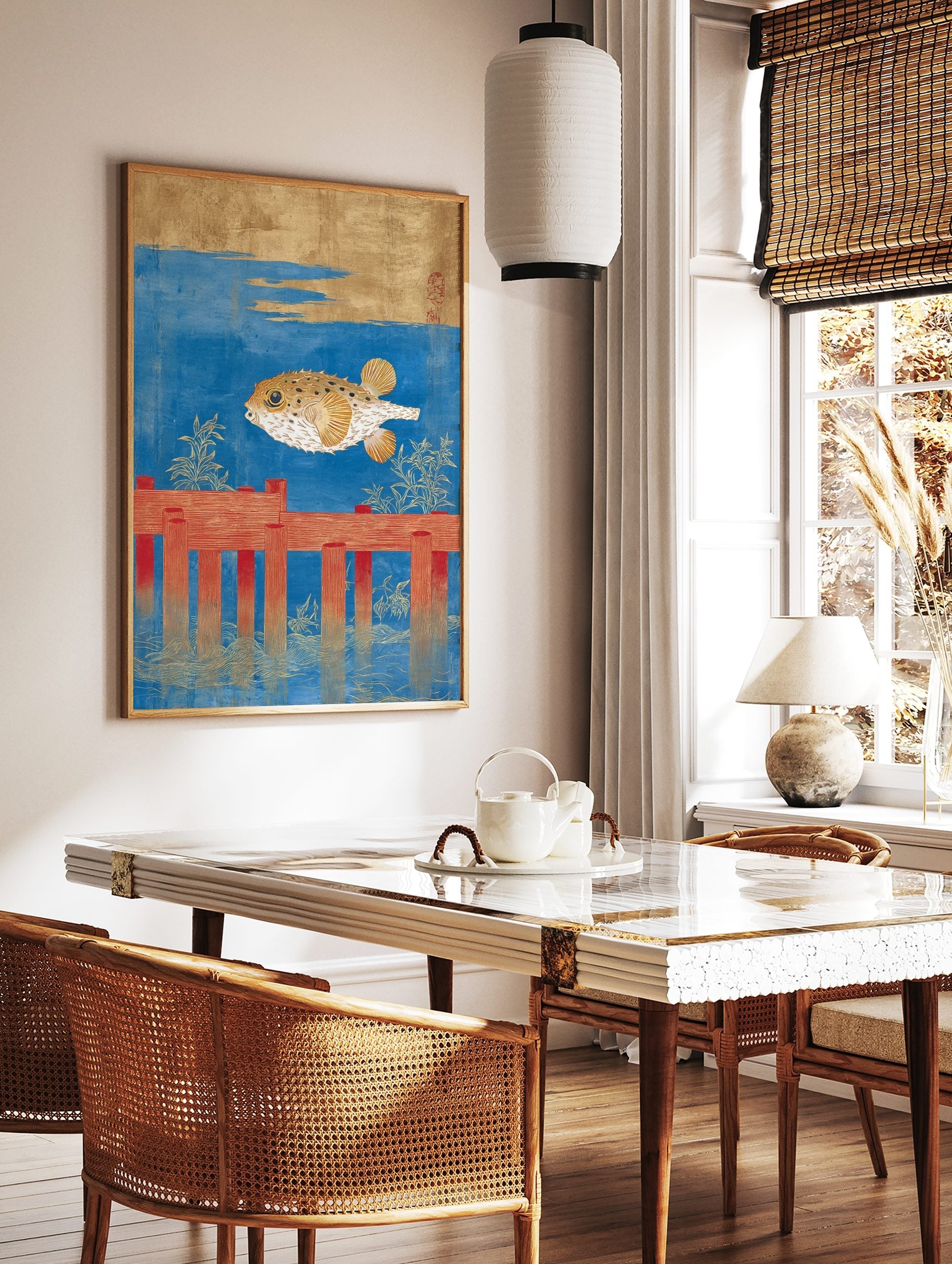 Japanese pufferfish art print with a golden fugu swimming above red wooden posts in blue water, in a styled room mockup