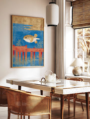 Japanese pufferfish art print with a golden fugu swimming above red wooden posts in blue water, in a styled room mockup