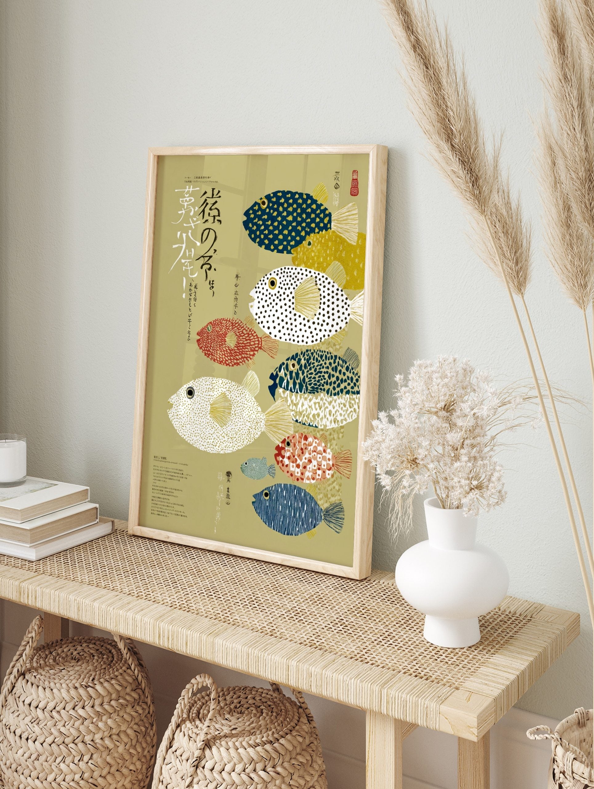 Japanese pufferfish illustration art print with various patterned fugu and calligraphy on a, in an alternate framed mockup