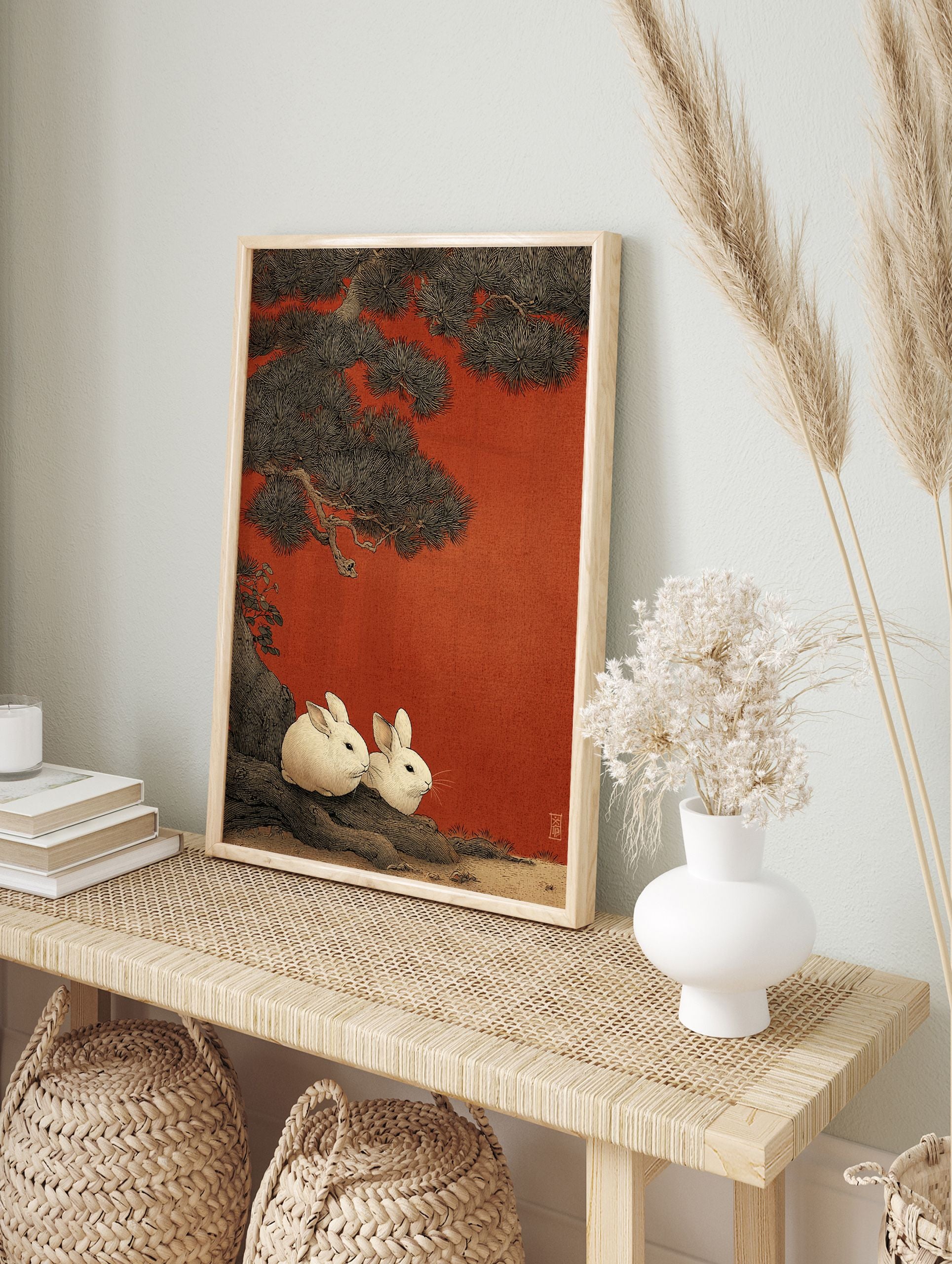 Japanese Rabbit Wall Art print featuring two white rabbits under a large pine tree against a vibrant red, textured background. - Image 3
