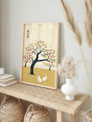 Traditional Japanese rabbit wall art with two white rabbits under a red fruit tree and golden leaves on a textured yellow background. - Image 3