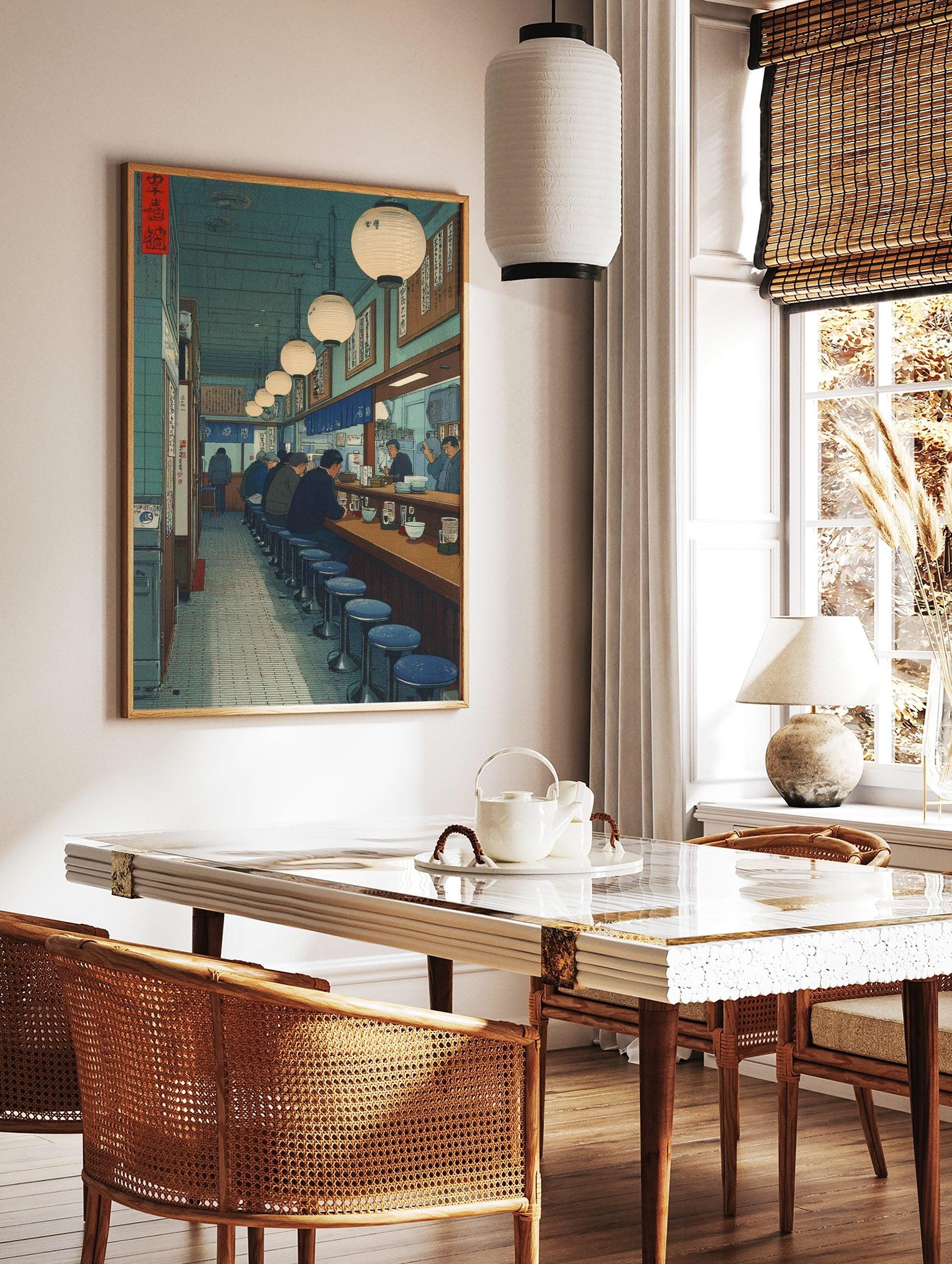Japanese ramen bar interior art print with patrons at counter, blue stools, glowing lanterns, and, in a styled room mockup