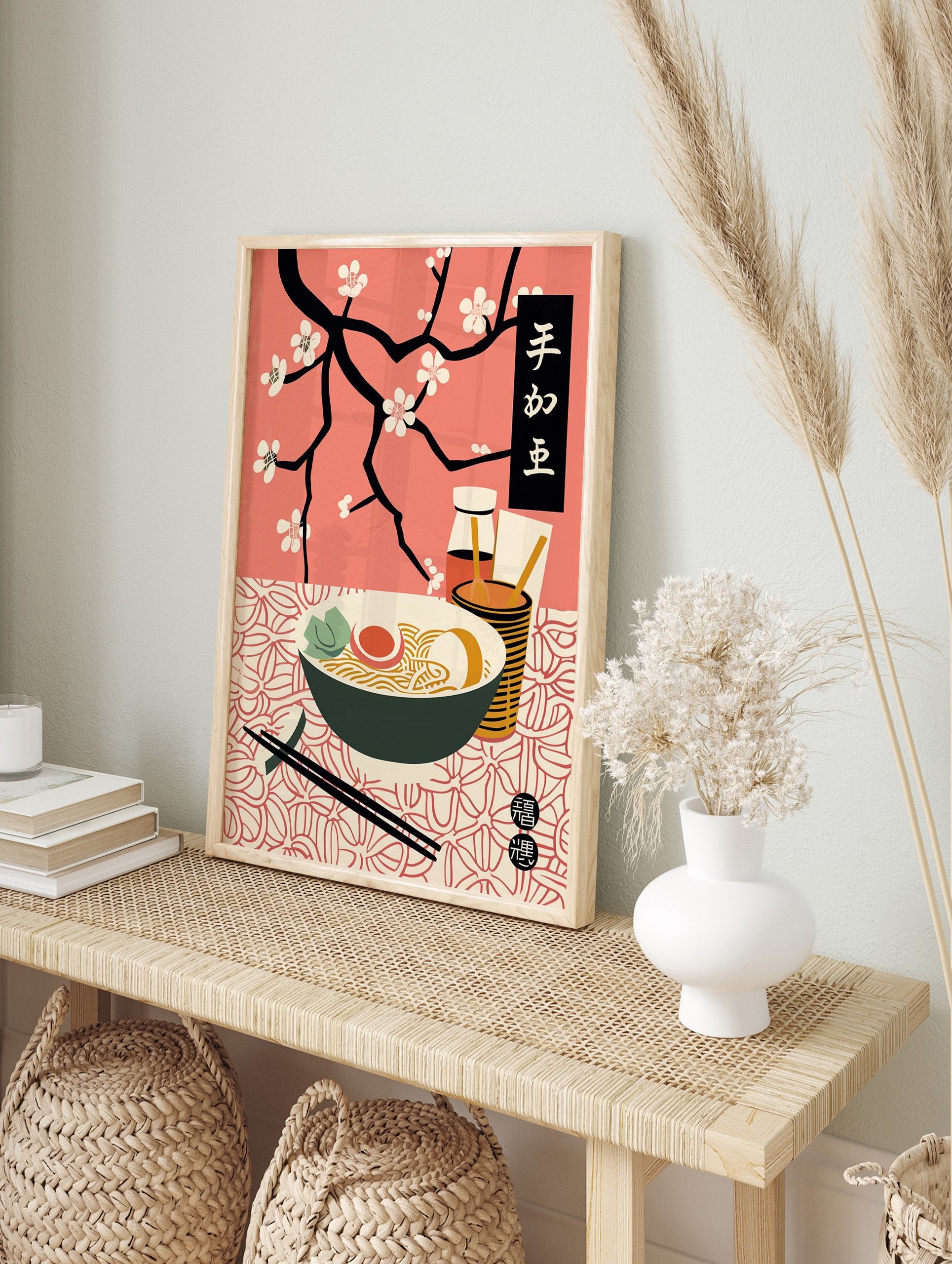 Japanese ramen poster with a bowl of noodles, egg, and greens, chopsticks, condiments, and black cherry blossom branches on a pink background. - Image 4