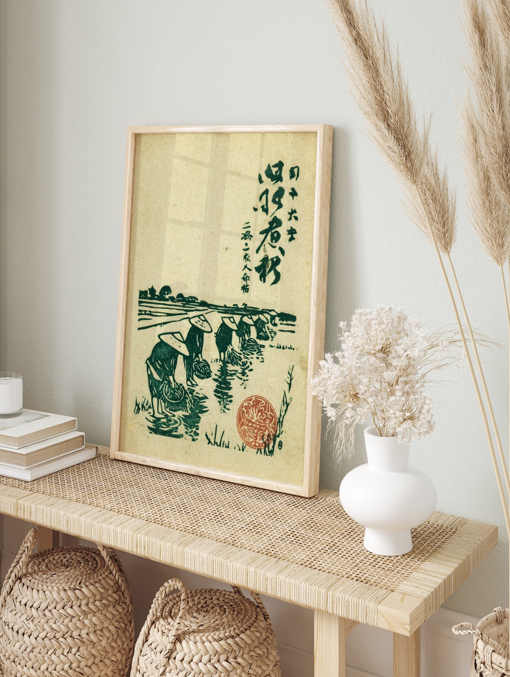 Japanese rice farmers in conical hats planting in a green paddy field, Ukiyo-e style, in an alternate framed mockup