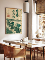 Japanese woodblock print showing four rice planters in a green paddy field with distant hills and, in a styled room mockup