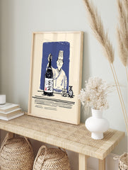 Japanese chef in hat holding large sake bottle, with sake cup and carafe on table, blue, in an alternate framed mockup