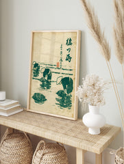 Japanese ukiyo-e style print of three figures in conical hats harvesting seaweed in green and, in an alternate framed mockup