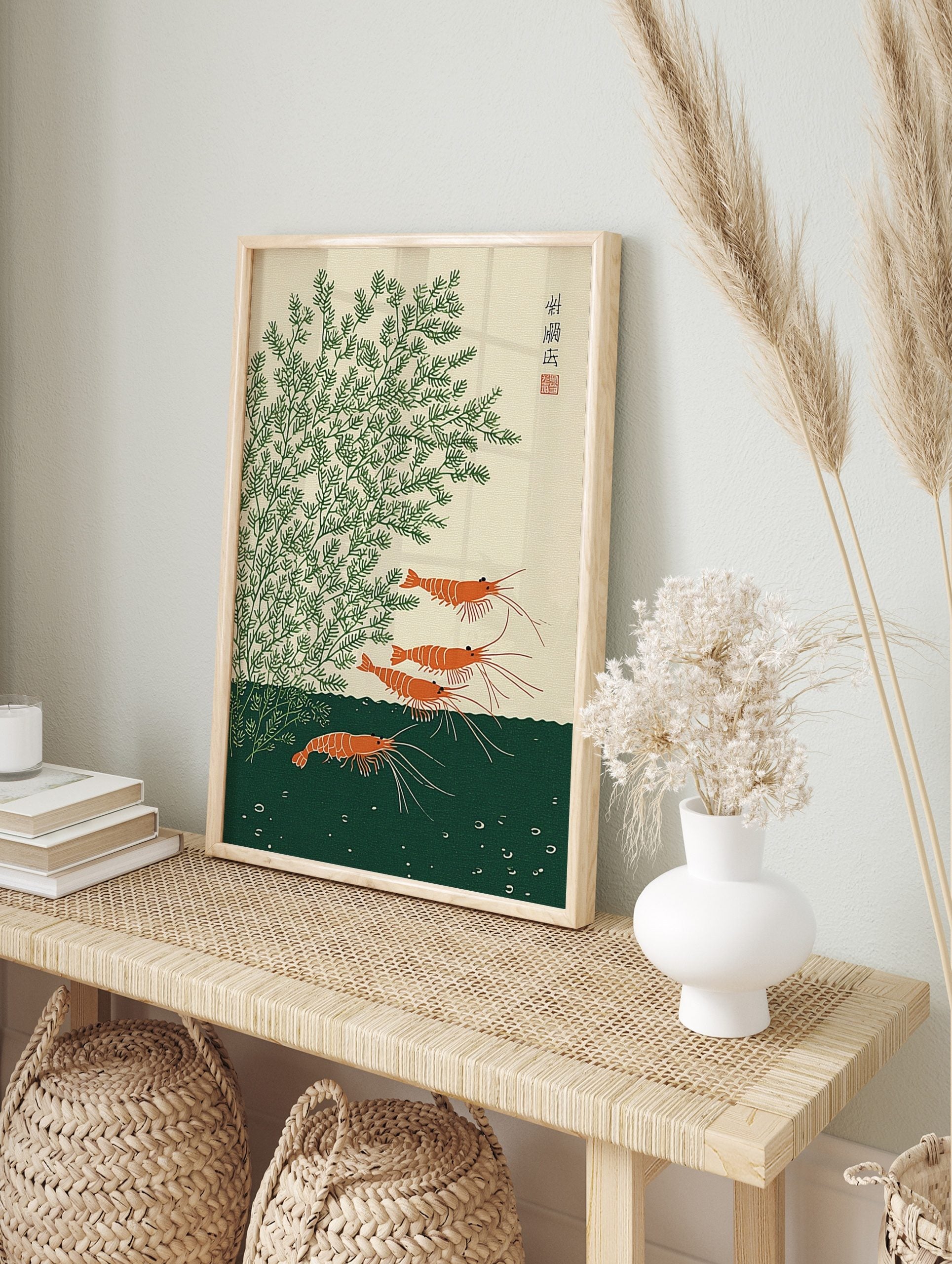Japanese shrimp wall art featuring orange prawns and green aquatic plants in a woodblock, in an alternate framed mockup