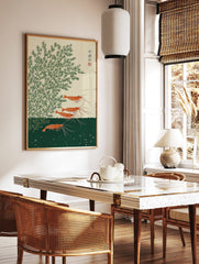 Japanese shrimp wall art featuring orange prawns and green aquatic plants in a woodblock print style, in a styled room mockup