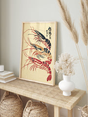 Japanese woodblock print style art featuring three red, black, and gold shrimp with Kanji, in an alternate framed mockup