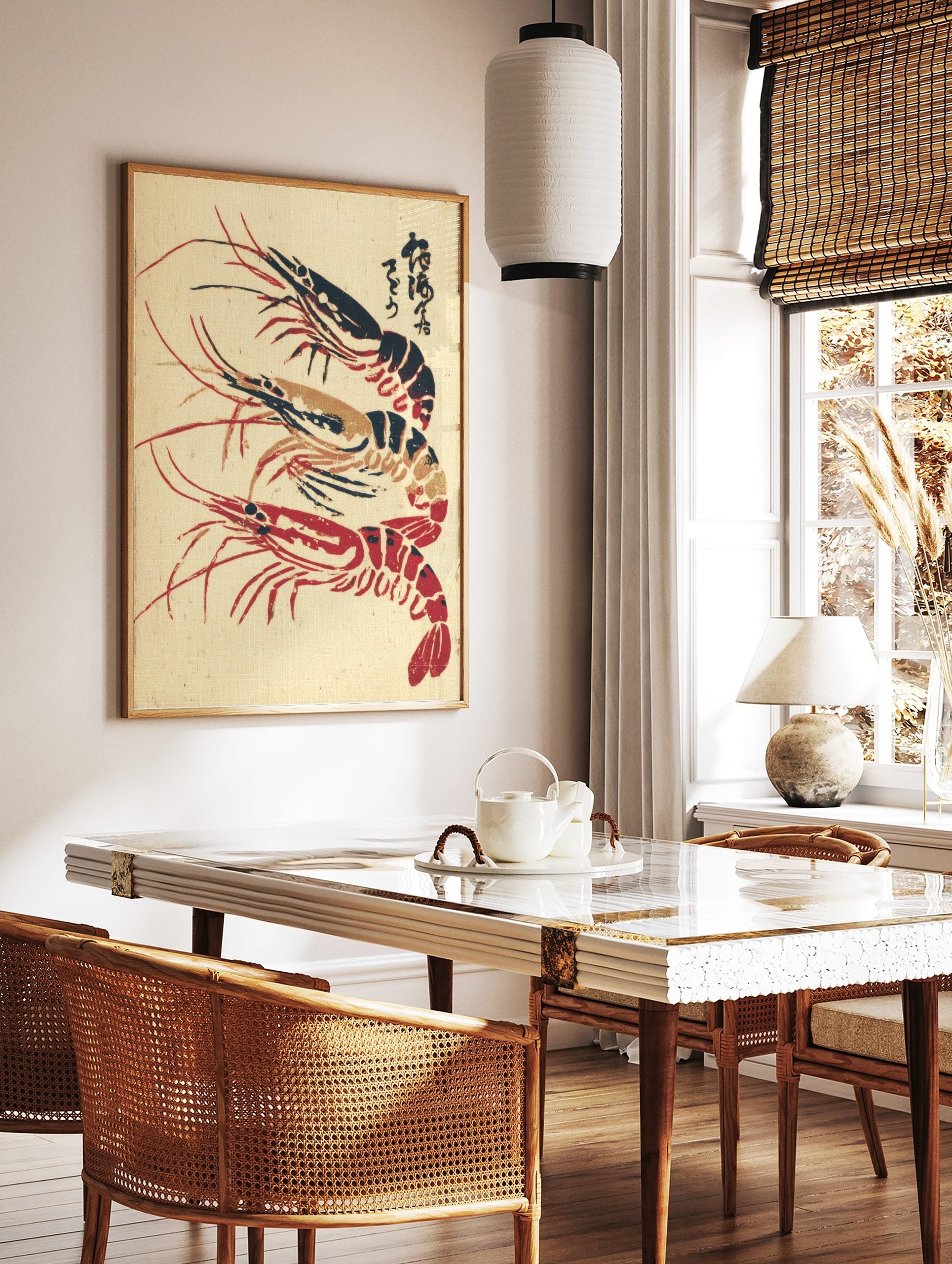 Japanese woodblock print style art featuring three red, black, and gold shrimp with Kanji text on a, in a styled room mockup