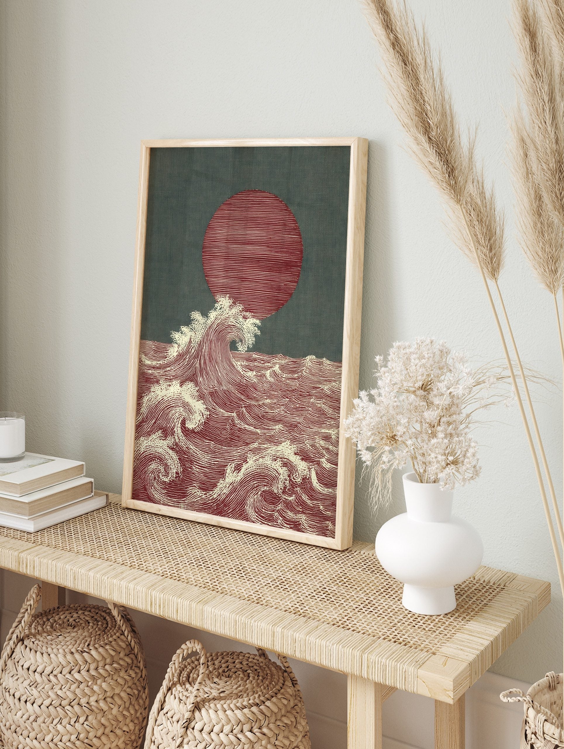 Japanese style ocean waves art print with a large red sun and white cresting waves on a dark, in an alternate framed mockup