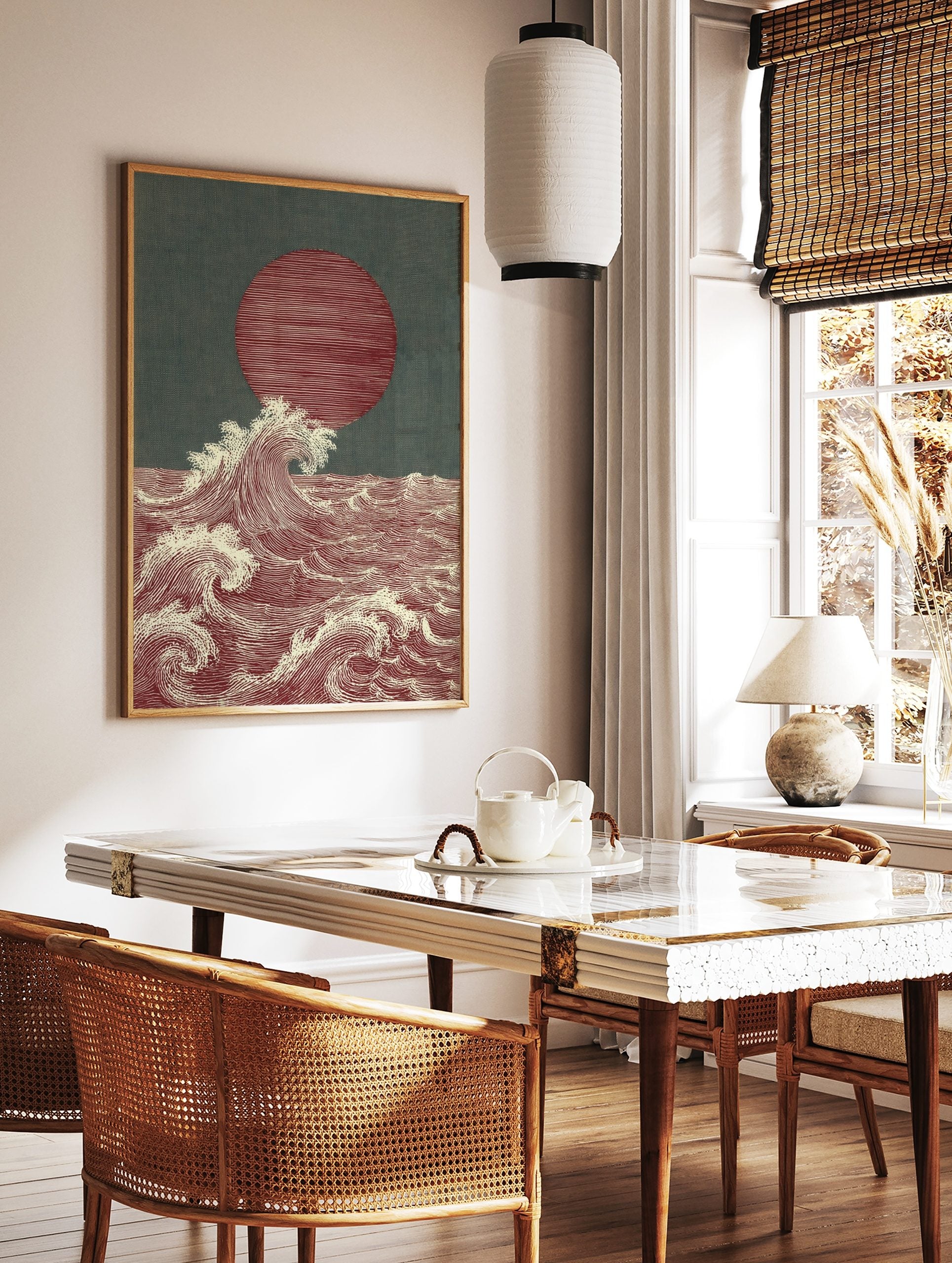 Japanese style ocean waves art print with a large red sun and white cresting waves on a dark teal, in a styled room mockup