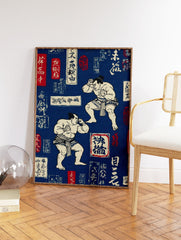 Two traditional Japanese sumo wrestlers depicted mid-bout on a deep blue background with white and red calligraphy, Japanese Sumo Wall Art. - Image 2