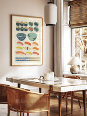 Illustrative Japanese sushi, maki rolls, nigiri, and side dishes with blue bowls and chopsticks on, in a styled room mockup