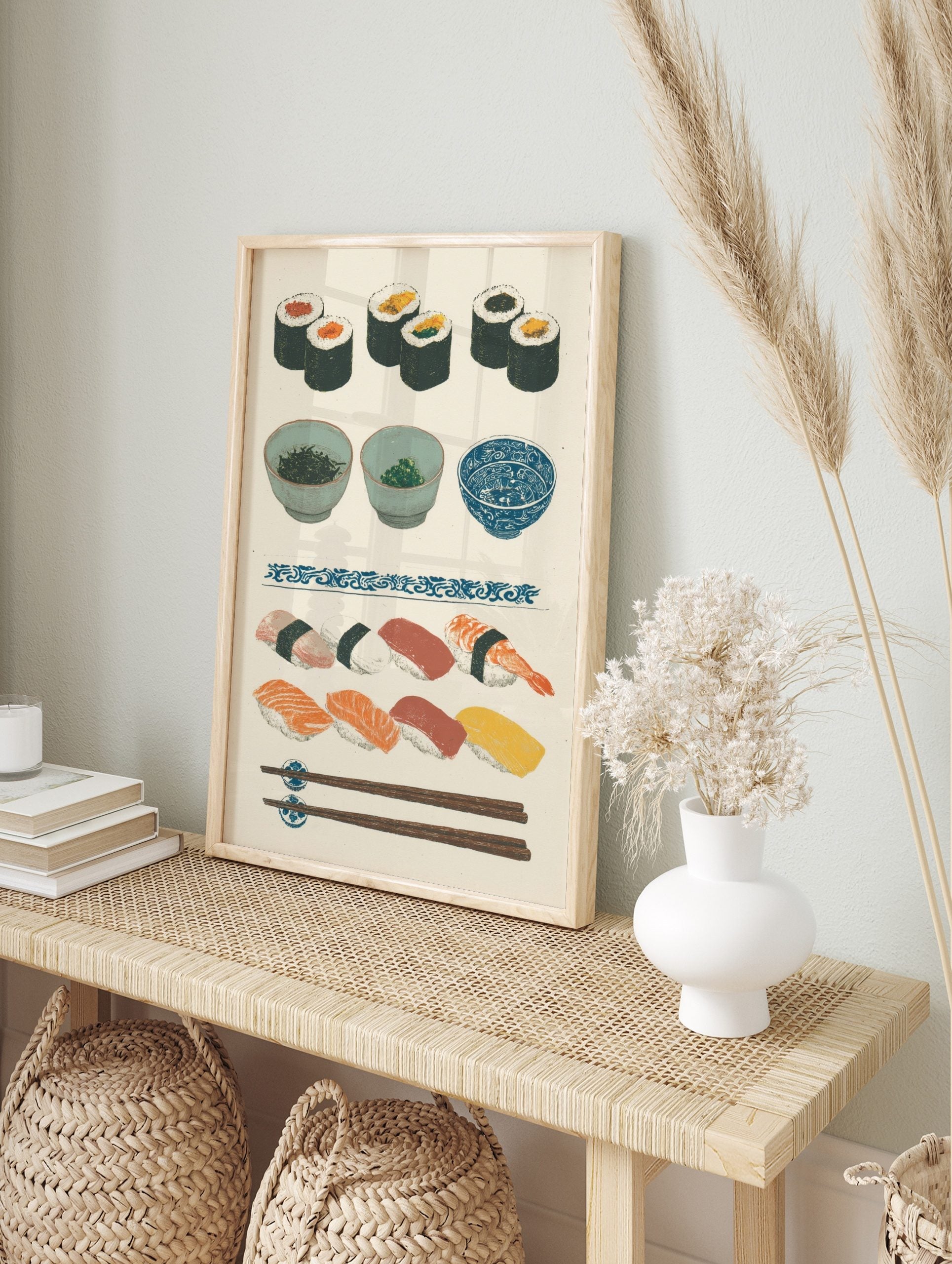 Japanese sushi wall art print with maki rolls, nigiri, bowls, and chopsticks on a light, in an alternate framed mockup