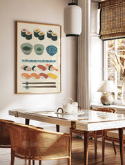 Japanese sushi wall art print with maki rolls, nigiri, bowls, and chopsticks on a light background, in a styled room mockup