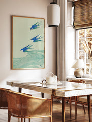 Japanese swallow wall art print showing three blue and green birds flying over teal waves on a light green background. - Image 2