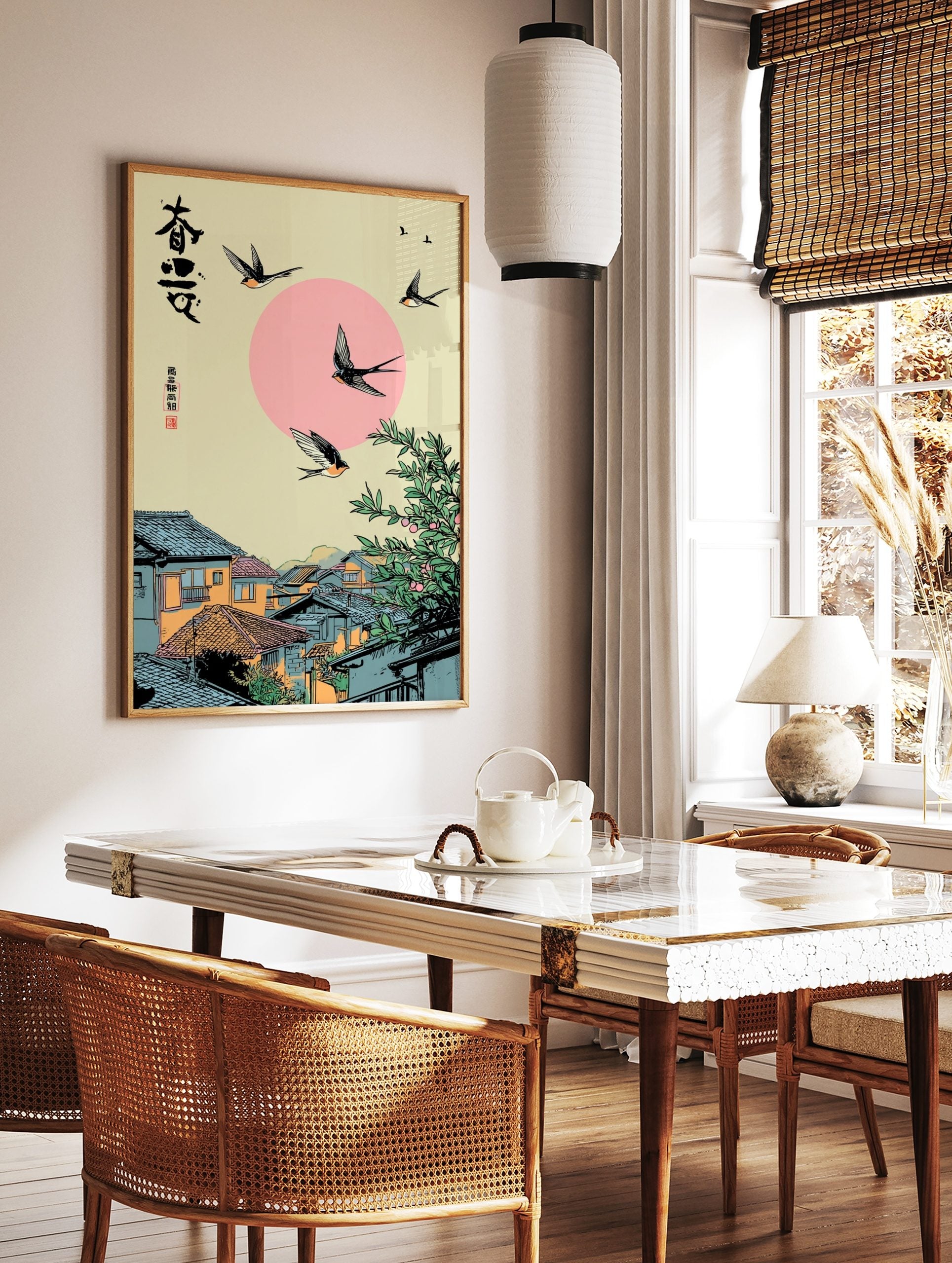 Japanese swallows flying over a traditional village with a pink sun and green tree, featuring, in a styled room mockup