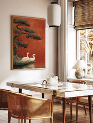Japanese Swan Wall Art print showing two white swans by a lake with a large pine tree against a red background. - Image 2
