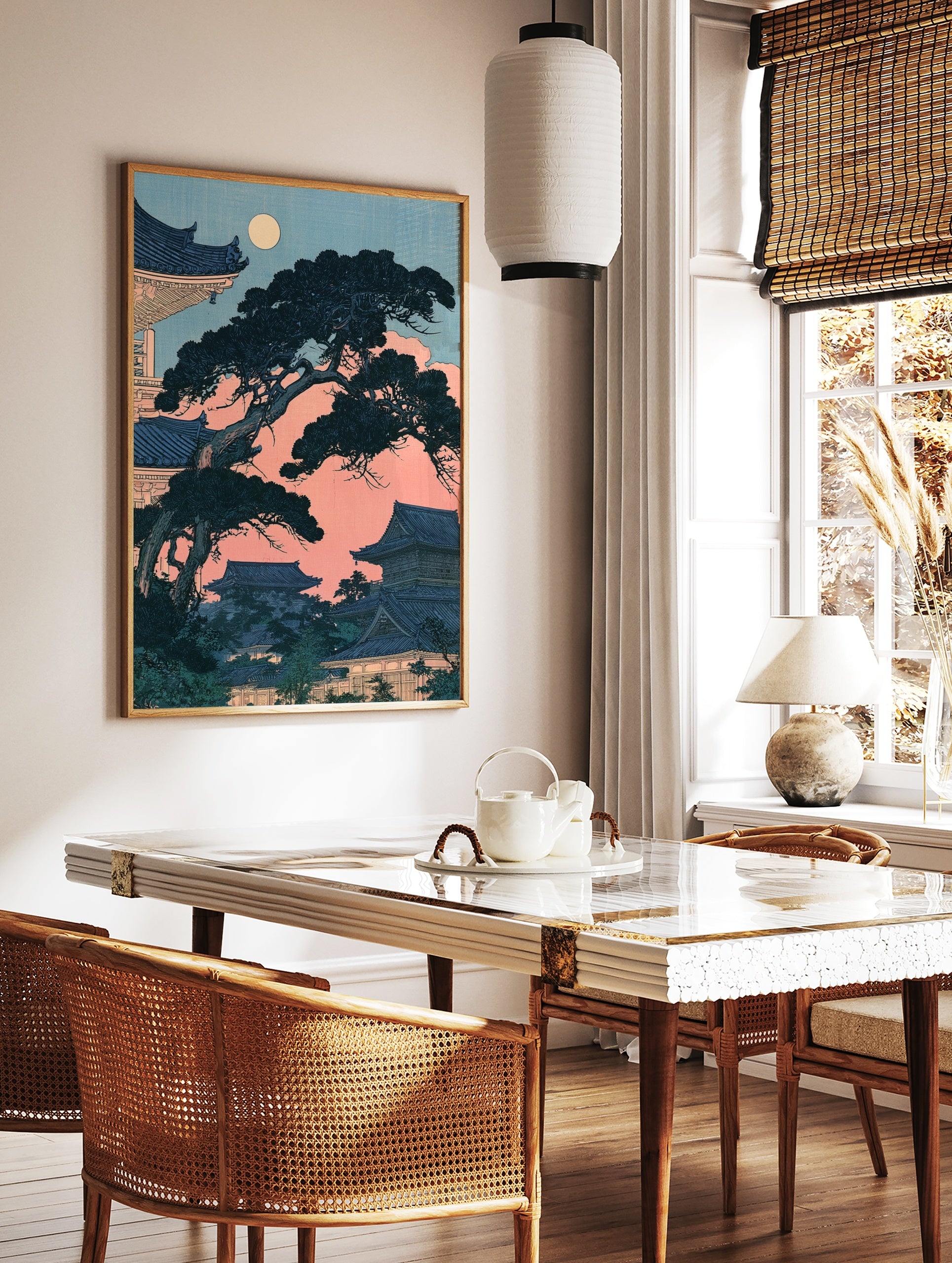 Japanese pagoda and pine tree illustration under a full moon with pink sky and blue architecture, in a styled room mockup