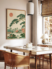 Japanese landscape art print with a pine tree, temple architecture, and a red sun on a neutral, in a styled room mockup