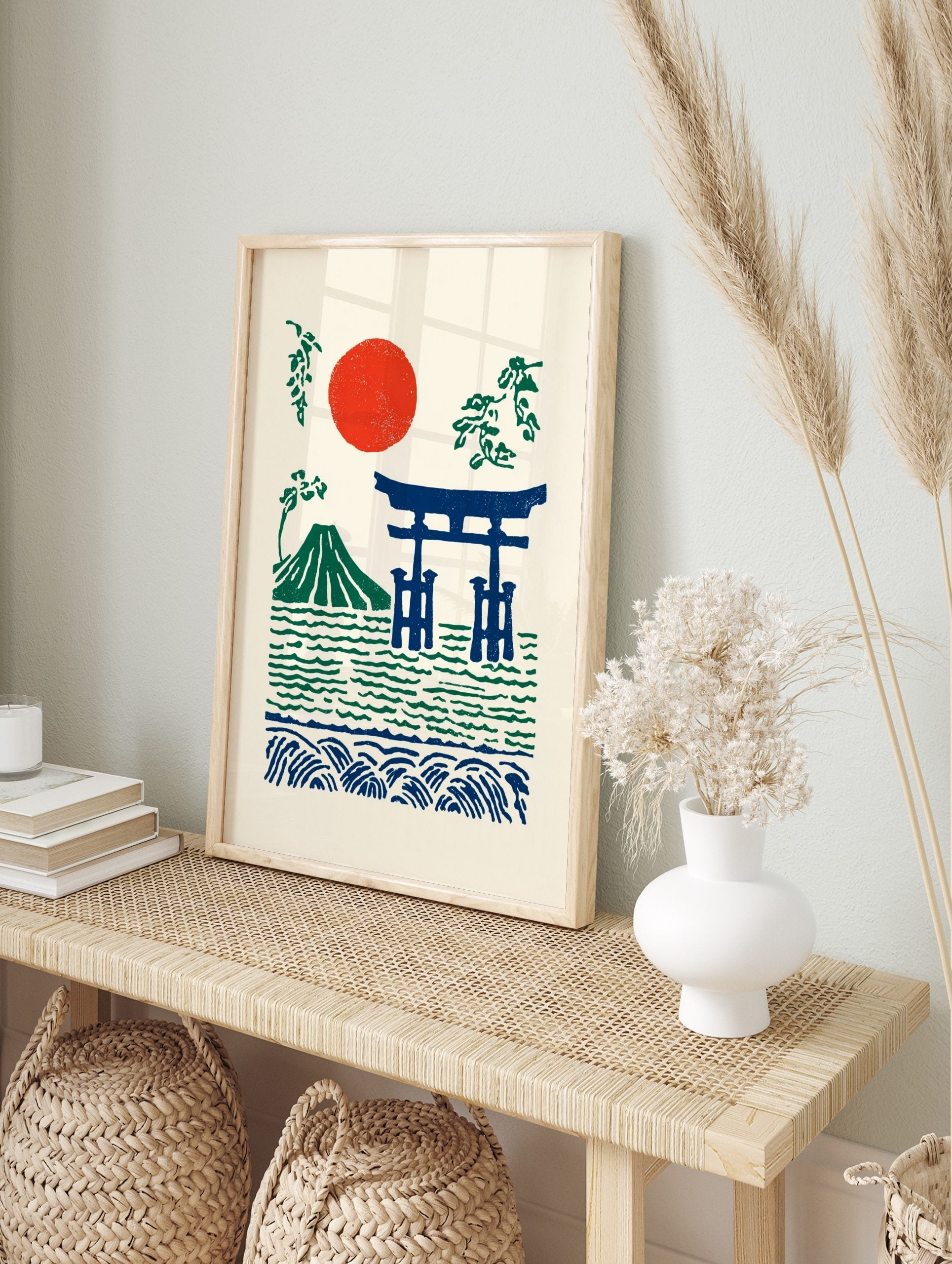 Illustrative Japanese landscape print with red sun, green Mount Fuji, and blue torii gate in, in an alternate framed mockup
