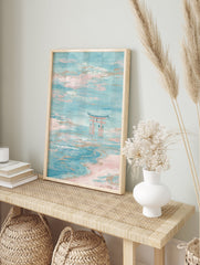 Abstract Japanese Torii Gate wall art in pastel blue and pink tones, standing in calm water under a cloudy sky. - Image 3