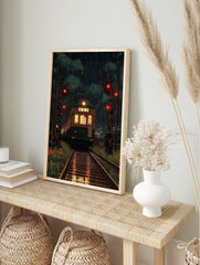 Japanese train poster showing a green train on tracks at night in the rain, with red signal lights and city lights. - Image 4