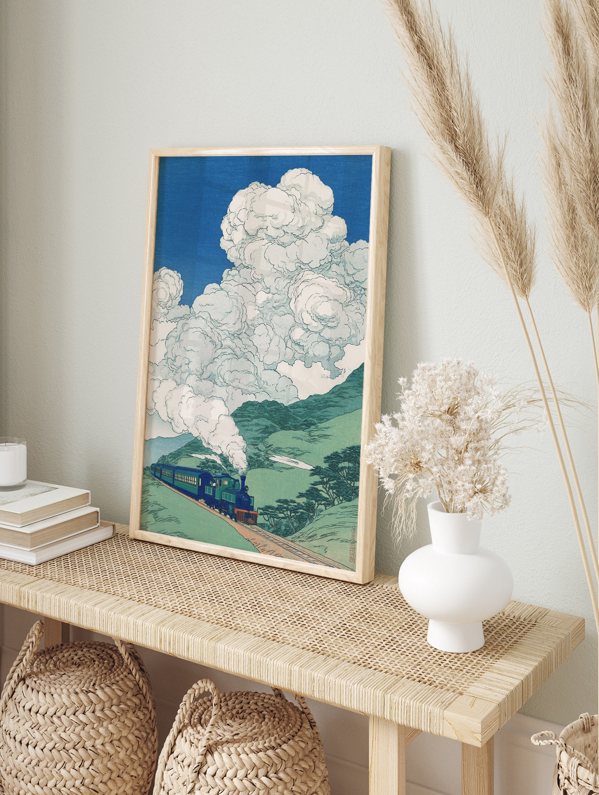 Japanese Train Print depicting a blue train with steam, traveling through green mountains under a bright blue sky with white clouds. - Image 3