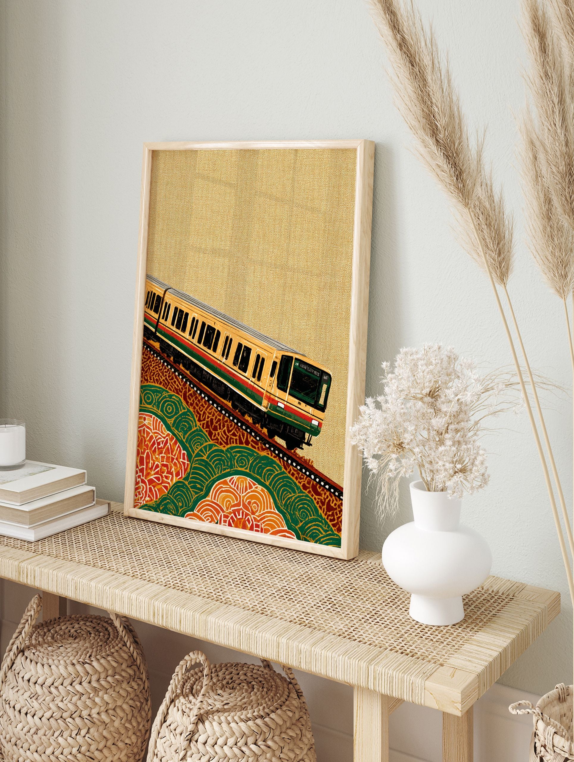 Yellow Japanese commuter train on tracks, ascending a hill with green and orange abstract patterns, cultural train wall art. - Image 3