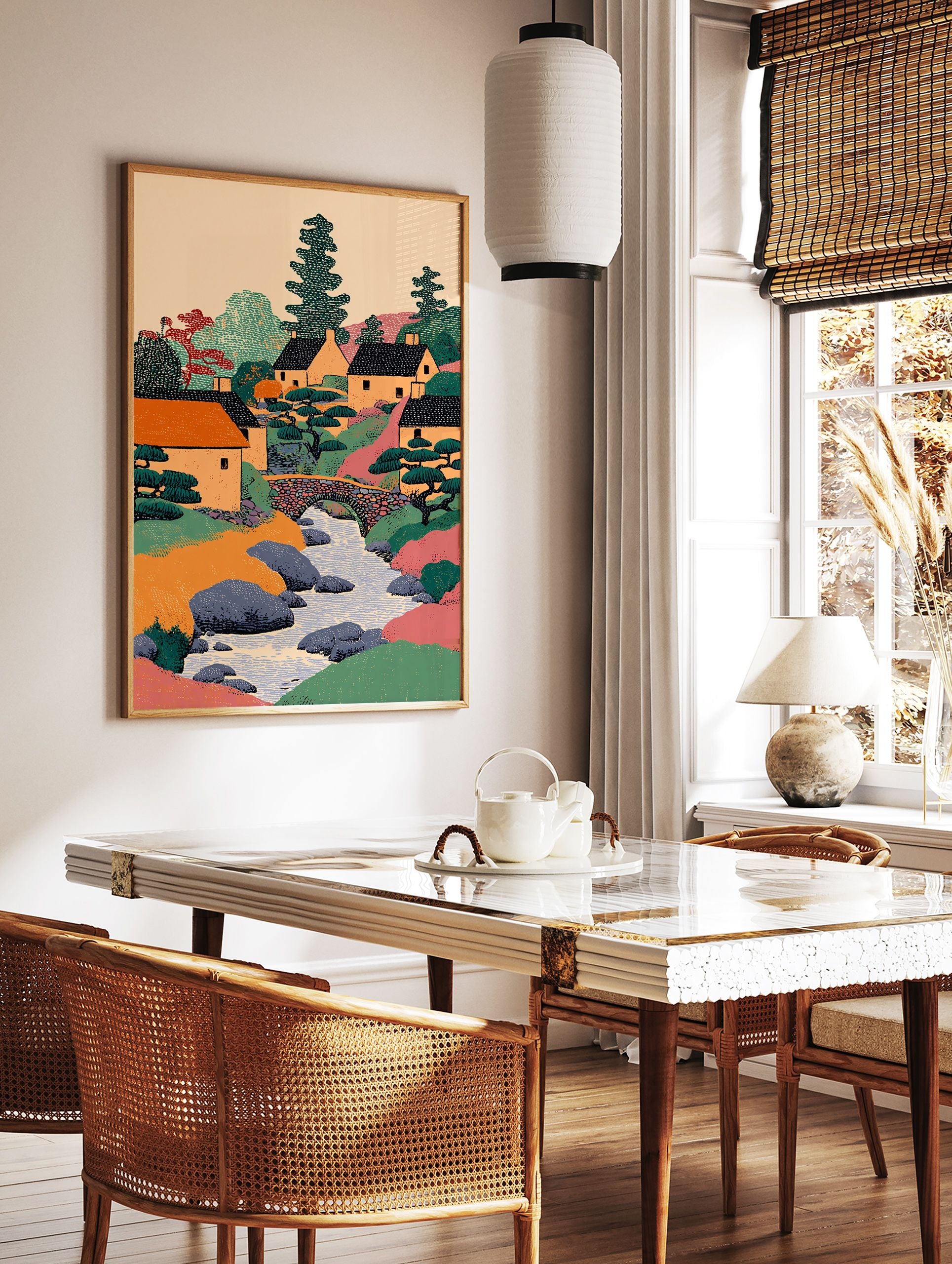 Illustrative Japanese village wall art showing houses, a river, stone bridge, and trees in a colorful landscape print. - Image 2