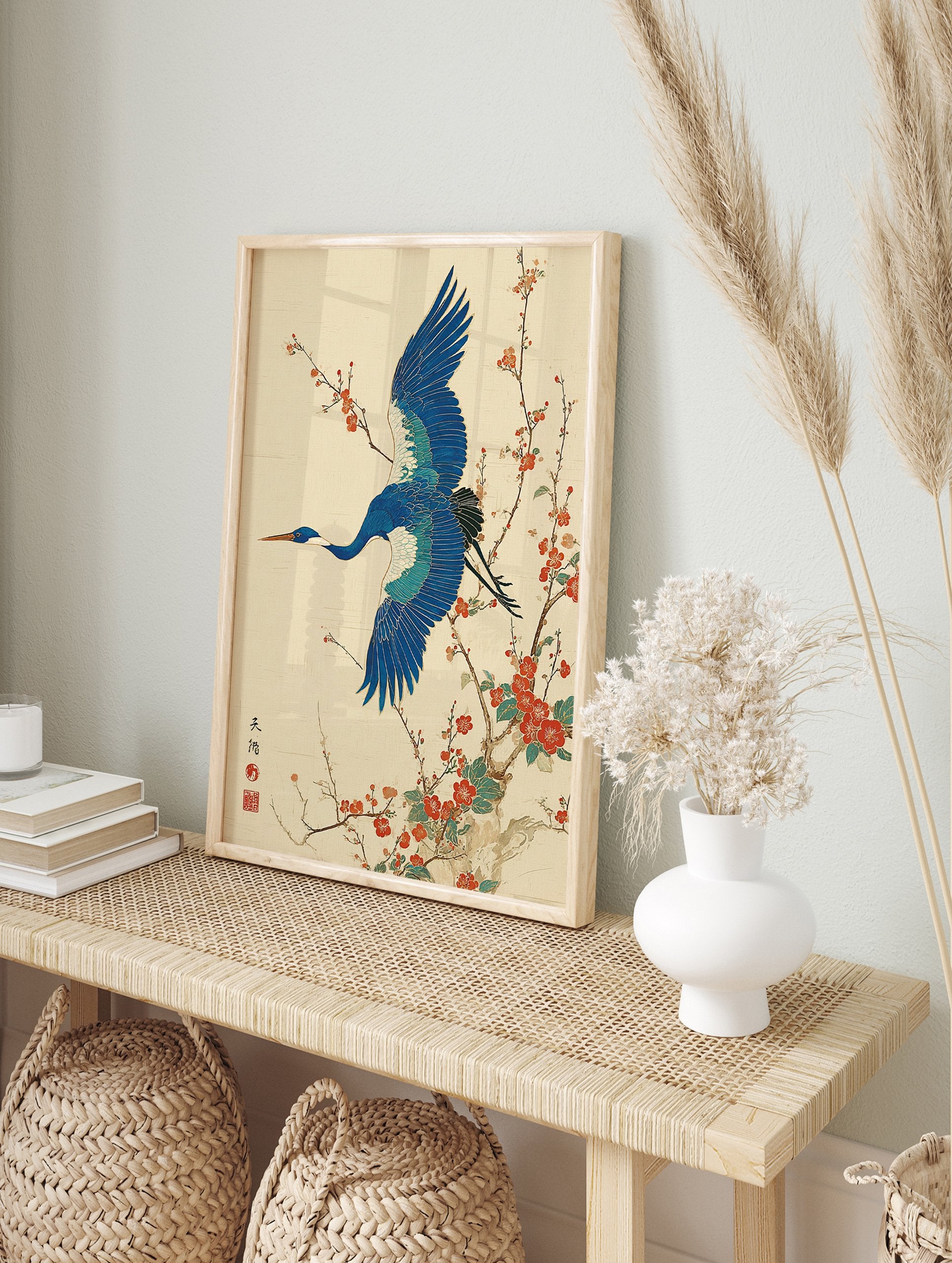 Japanese Wall Art print of a blue crane bird flying among red plum blossoms on a textured cream background. - Image 3