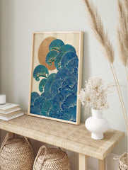 Traditional Japanese wall art print with stylized blue waves or pine branches, white outlines, and a golden sun on a cream background. - Image 3