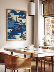 Japanese Wall Art print of a blue pagoda, traditional houses, and trees in a serene mountain landscape. - Image 3