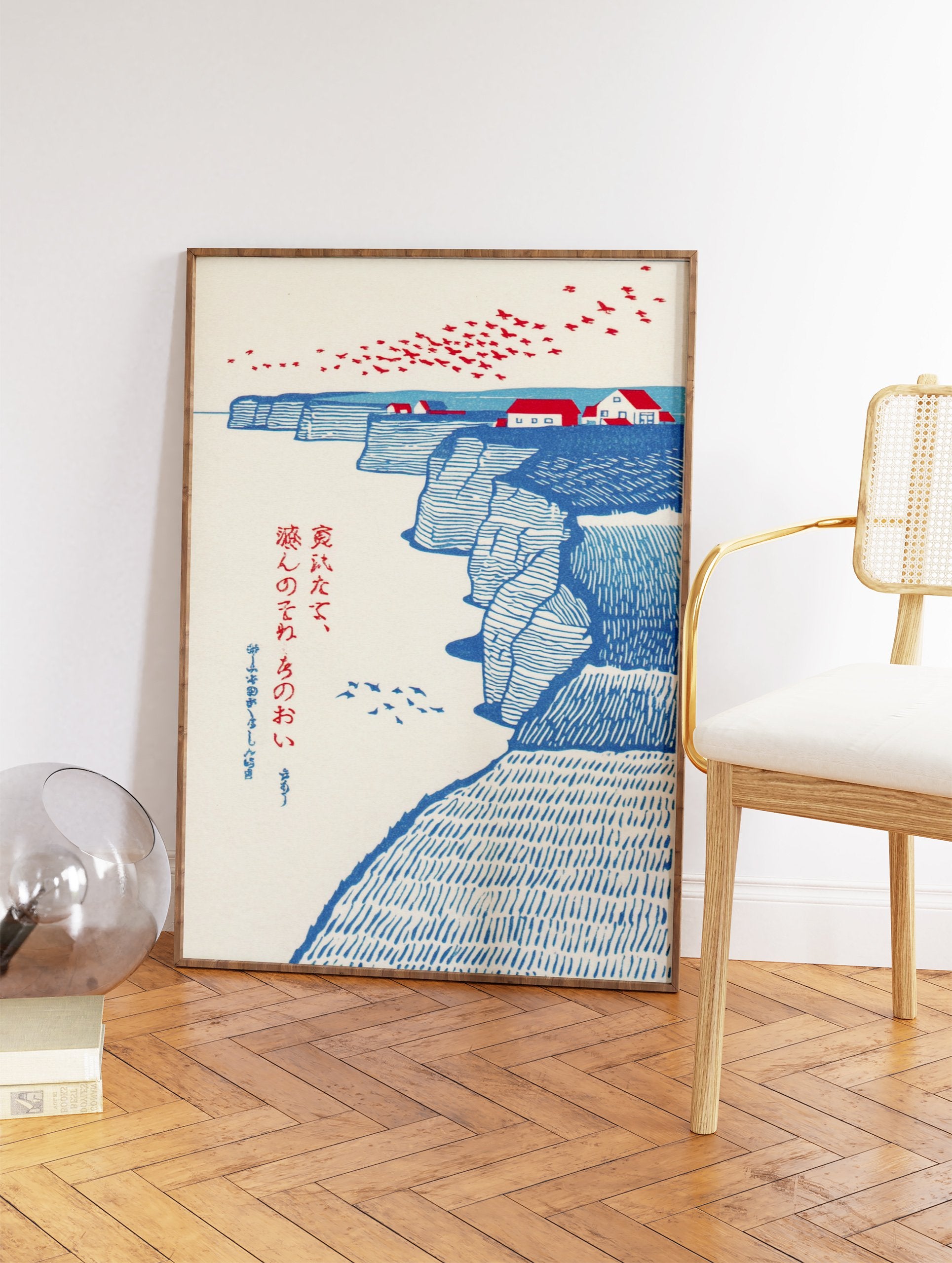 Japanese landscape wall art print with blue coastal cliffs, red-roofed houses, and red birds flying over the sea. - Image 2
