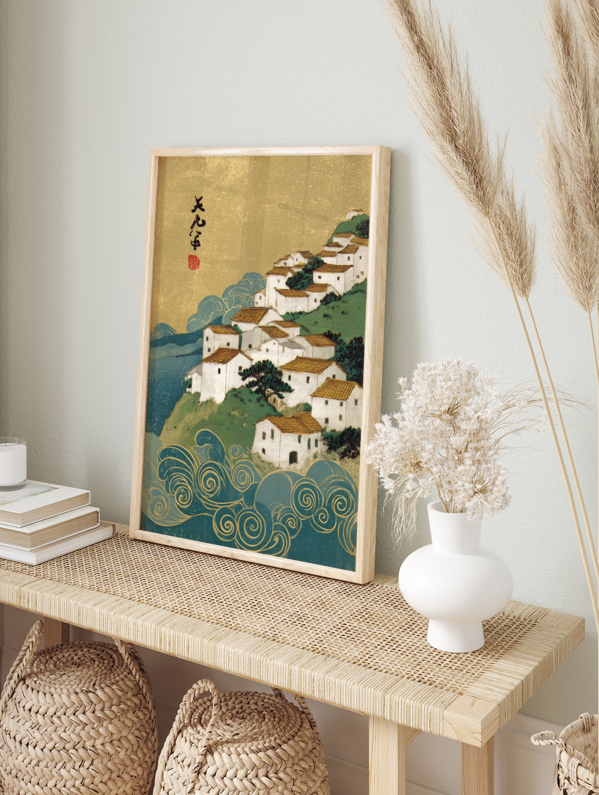 Japanese Wall Art print in Ukiyo-e style depicting a white coastal village on a green hill, with golden sky and blue waves. - Image 3