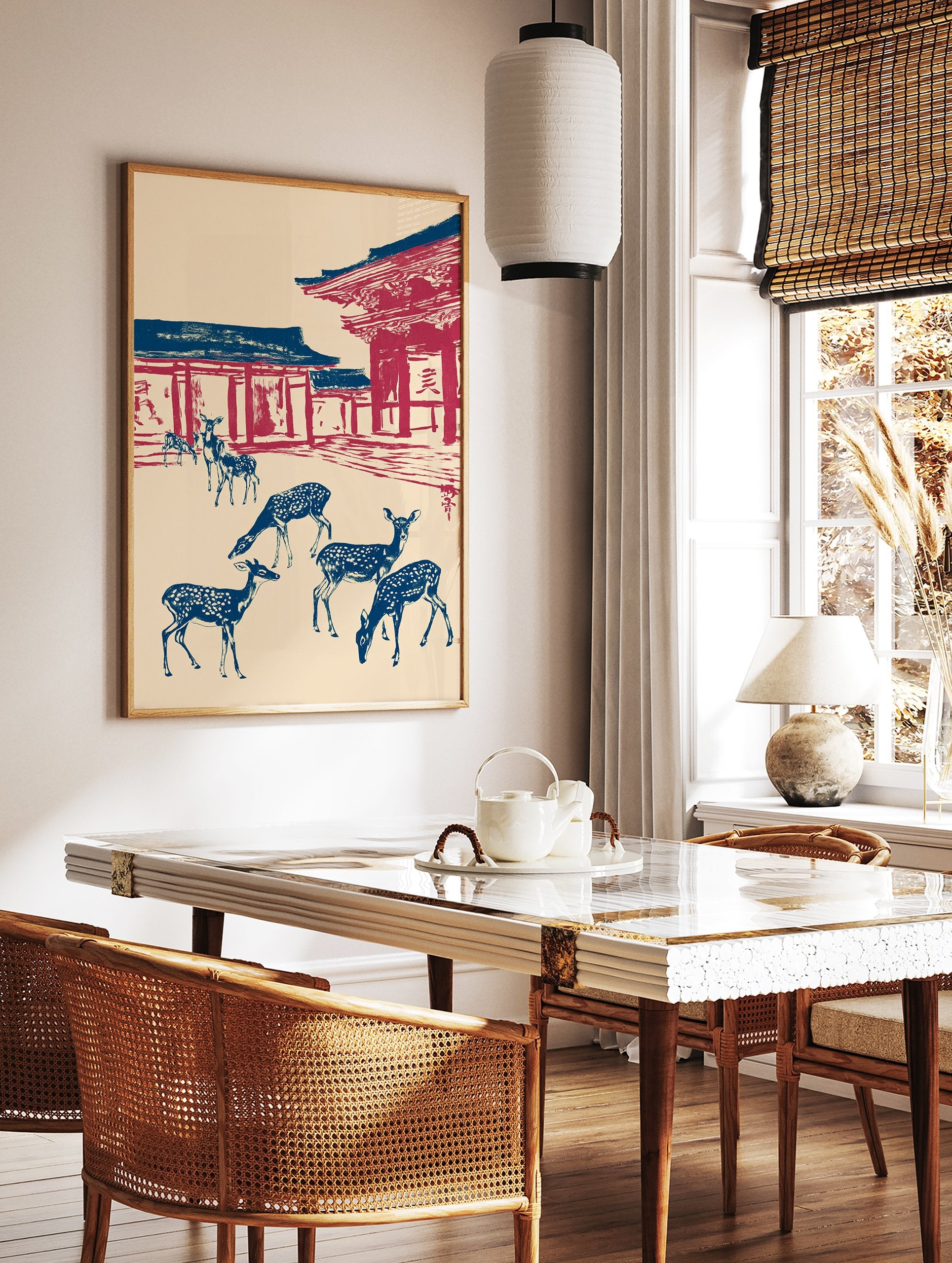 Japanese Wall Art print of blue deer with white spots in front of red and blue temple architecture on a cream background. - Image 2