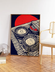 Japanese Dim Sum Wall Art showing two bamboo steamers with steamed buns and one with red food, on a mat with a red sun background. - Image 2