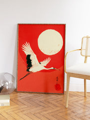 Ukiyo-e style Japanese wall art featuring a white flying crane with black wings against a vibrant red background and a large cream moon. - Image 2