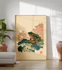 Japanese wall art print featuring a green and orange frog on lily pads with a traditional temple and trees in the background. - Image 3