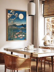 Japanese Wall Art print of a full moon over a pond with water lilies, tall reeds, and mountains in blue night tones. - Image 3