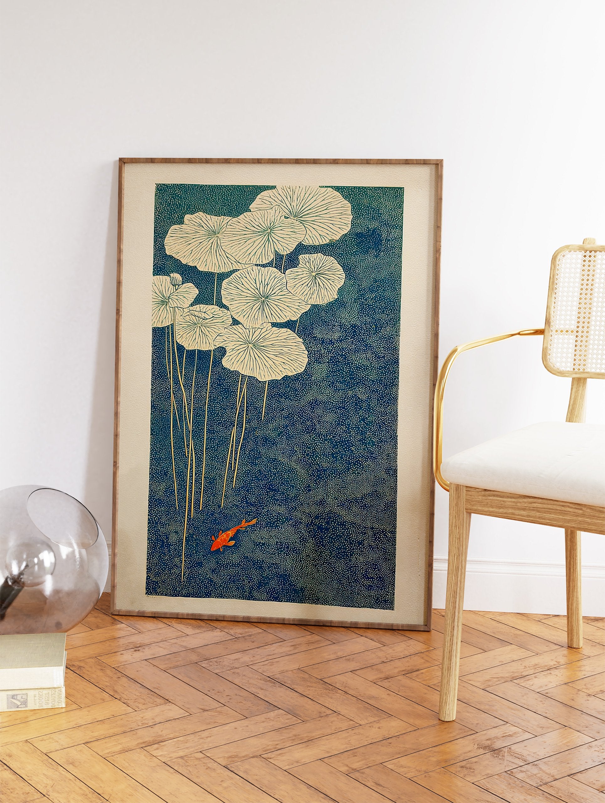 Japanese wall art print of an orange koi fish swimming among white water lilies in a deep blue pond with stippled texture. - Image 2