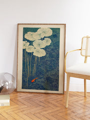 Japanese wall art print of an orange koi fish swimming among white water lilies in a deep blue pond with stippled texture. - Image 2