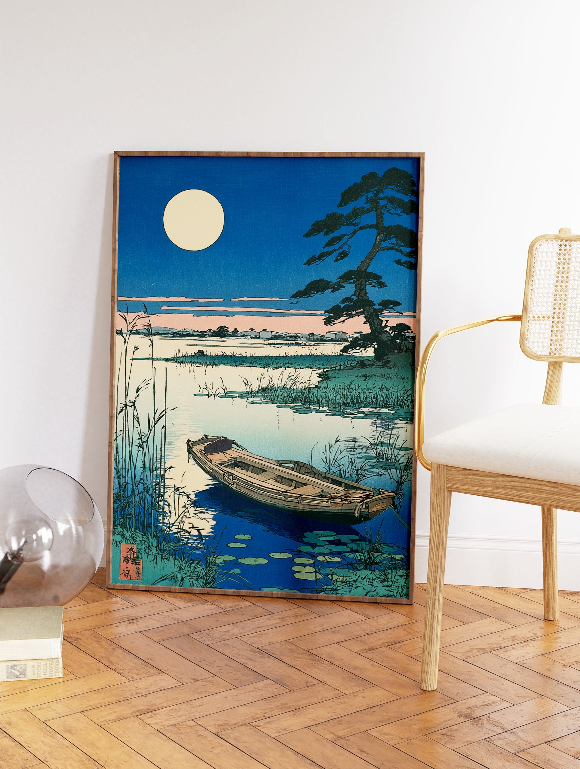 Japanese woodblock print of a full moon over a lake with a boat, reeds, and a pine tree in a serene landscape. - Image 2