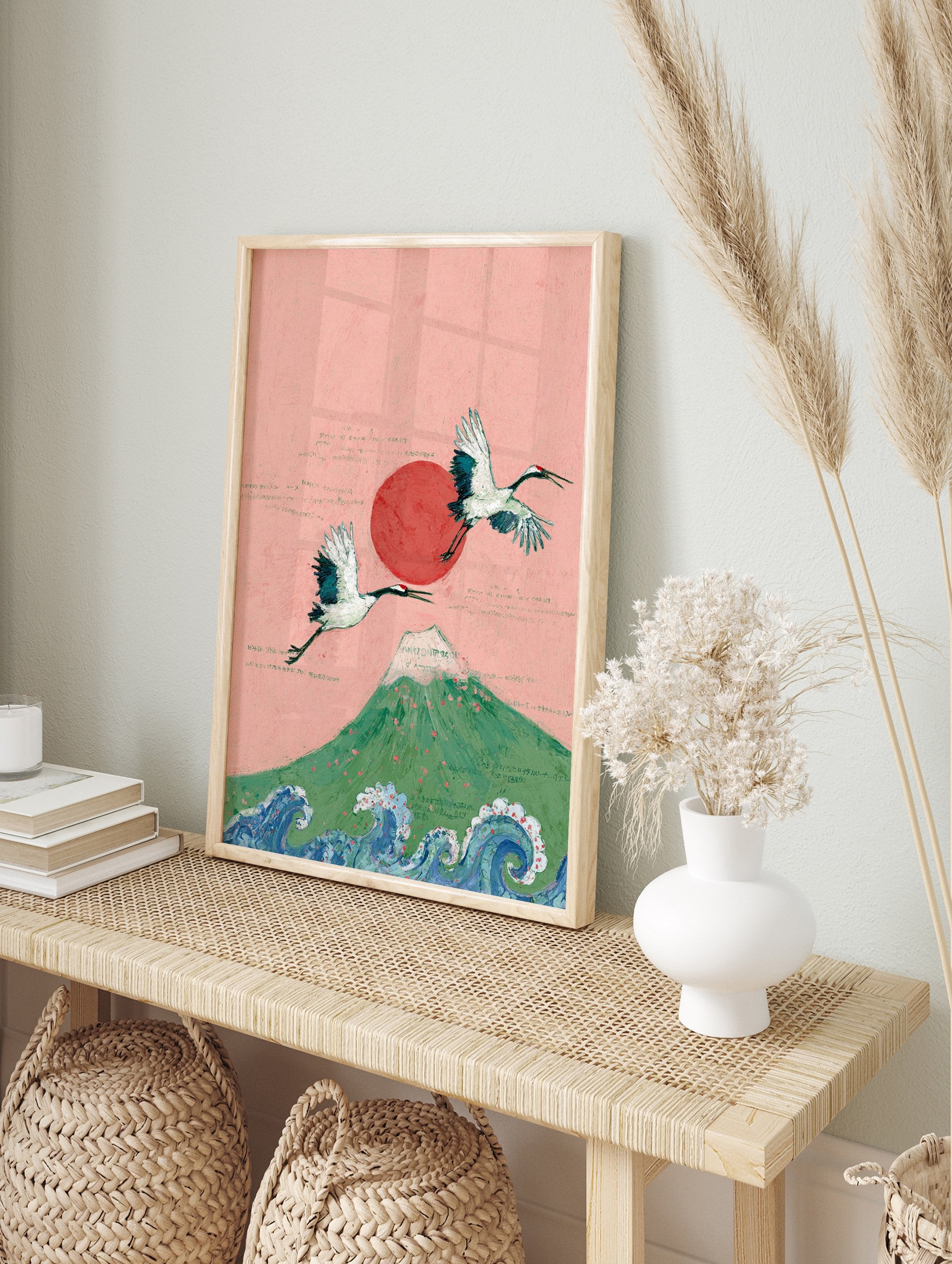 Japanese wall art featuring two majestic cranes flying over Mount Fuji with a red sun and ocean waves, on a pink background. - Image 3