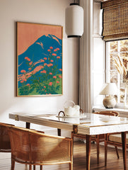 Japanese wall art print of Mount Fuji with red-orange flowers and a blue mountain against an orange sky. - Image 2
